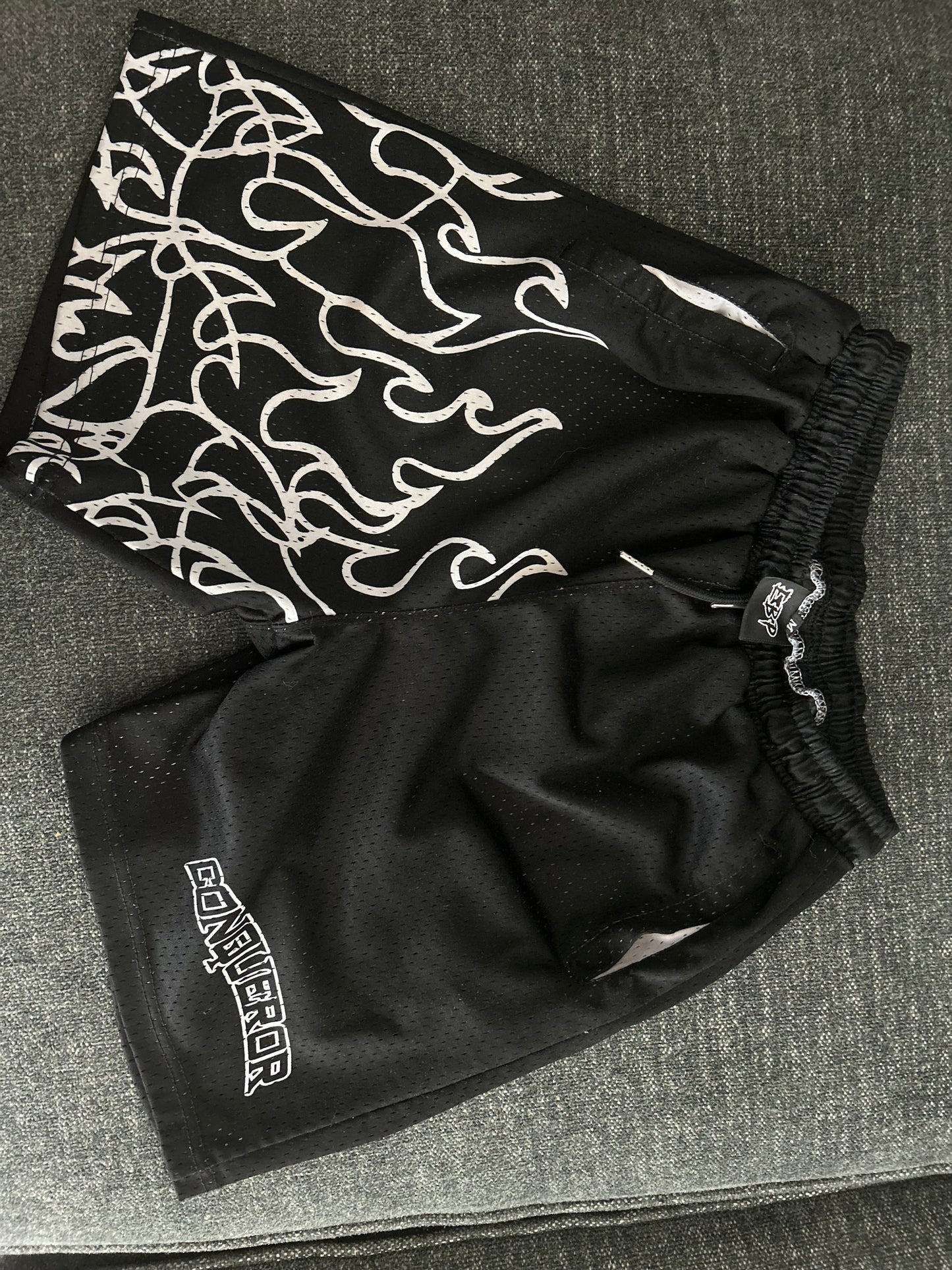 black conqueror shorts